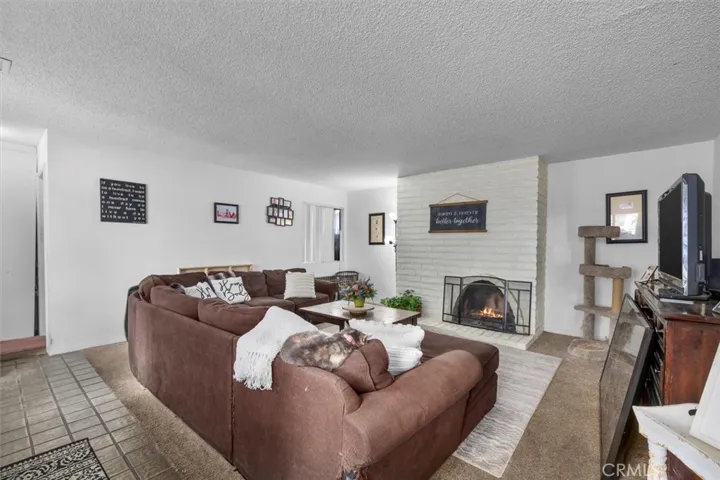 Brick fireplace in the living room of unit A