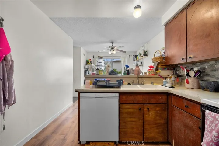 Unit C: Kitchen and bar top that separates dining space