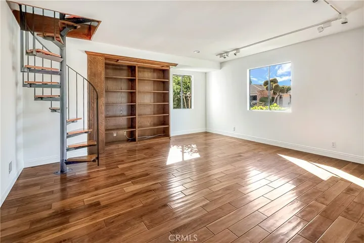 office below primary suite. Potential for an elevator in the spiral stair case location.