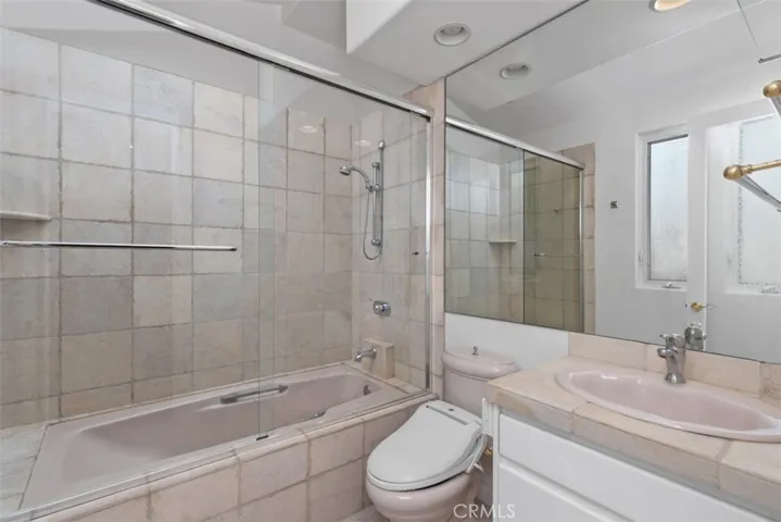 Front bedroom with wall bed has a full bathroom.  Very private at the front of the house.