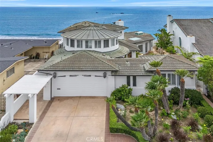 Breathtaking PANORAMIC OCEAN VIEWS! Steps from your yard to the beach, Coastal Commission Approved.