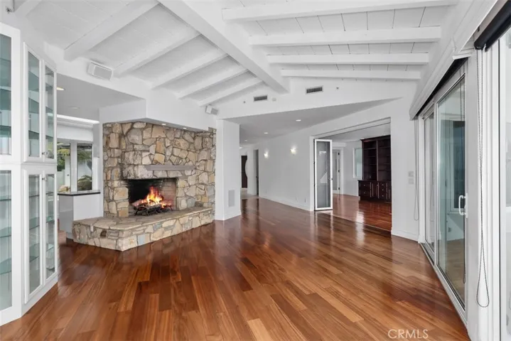 From the dining area south inside you can see into the office/library/bedroom with fireplace.  Silding decorative glass door can be completly open or closed for privacy.