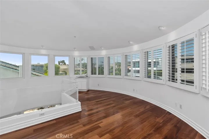 Turrett is very large with plenty of electricting, windows and lighting.  This room overlooks the entry of the house.