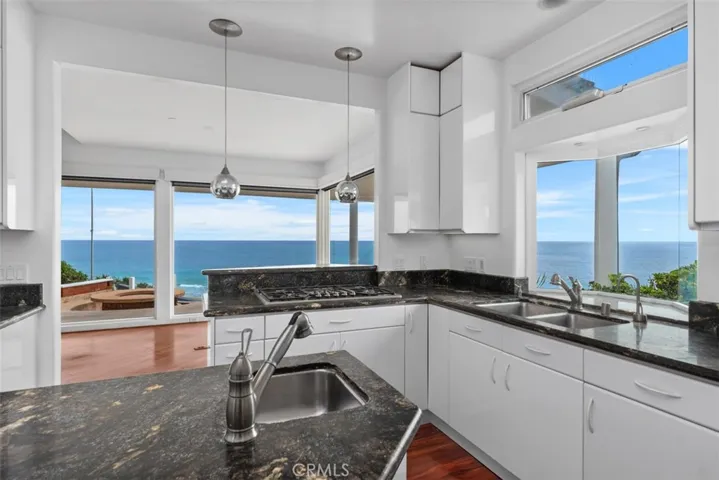 This kitchen boasts of views and accessibililty for easy entertaining.