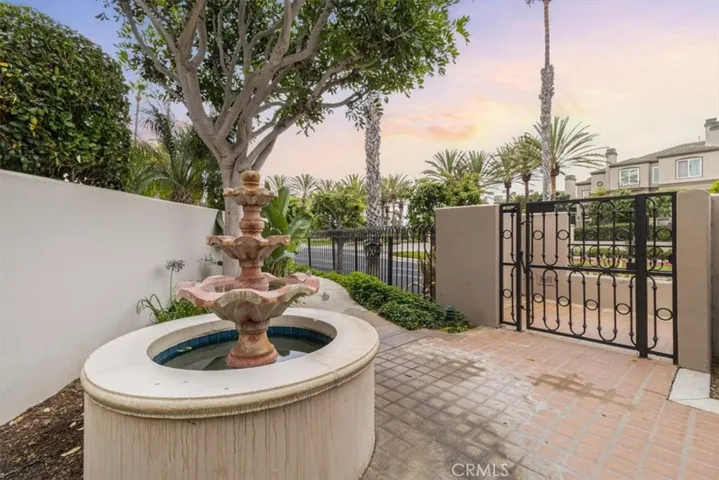 Charming gated path just steps from your front door—enjoy a short, scenic walk straight to the ocean.