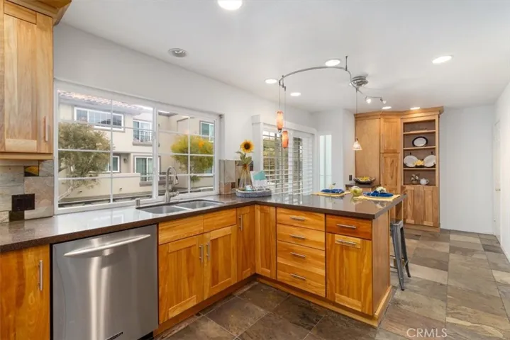 Enjoy exceptional storage with two spacious pantries—this well-designed kitchen combines functionality with style for effortless everyday living.