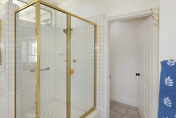 Primary bedroom shower and toilet closet