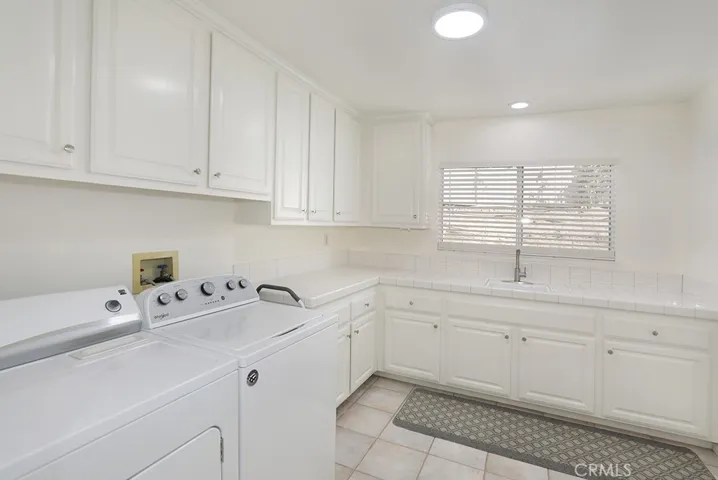 Huge dedicated laundry room on lower level