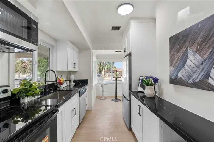 Kitchen looking towards breakfast nook and front of house