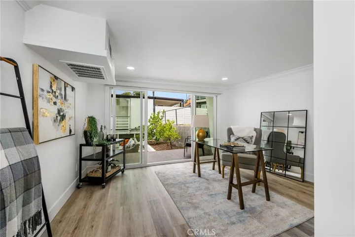 Downstairs Bedroom staged as an office great access to side yard.