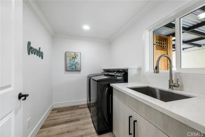 Separate Laundry Room with Sink