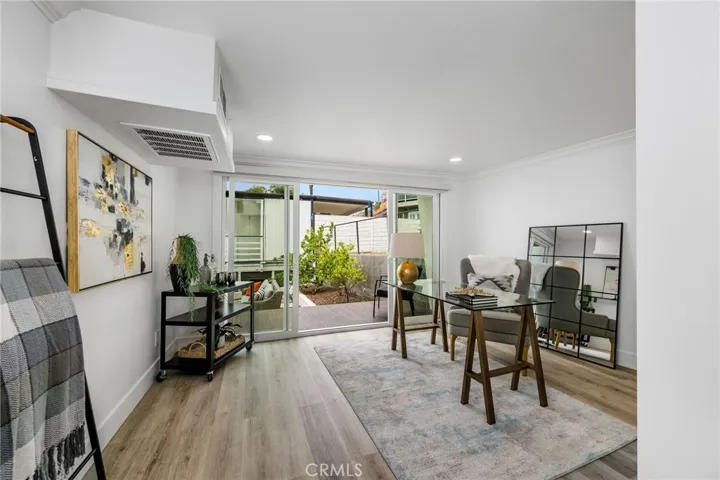 Downstairs Bedroom staged as an office great access to side yard.