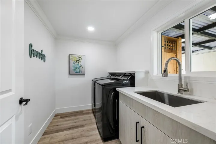 Separate Laundry Room with Sink