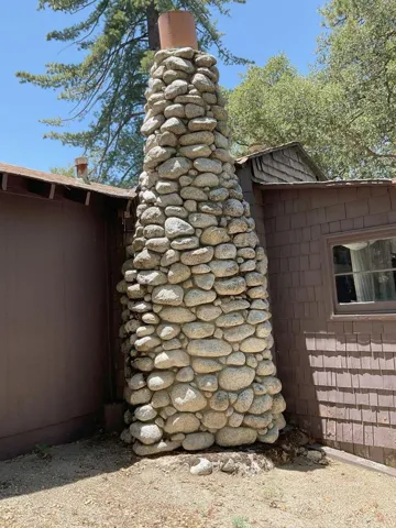 Original river rock chimney