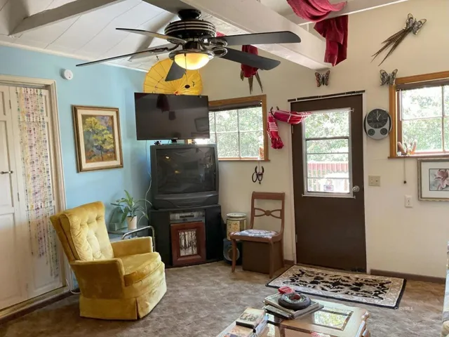 Living room towards access to side deck