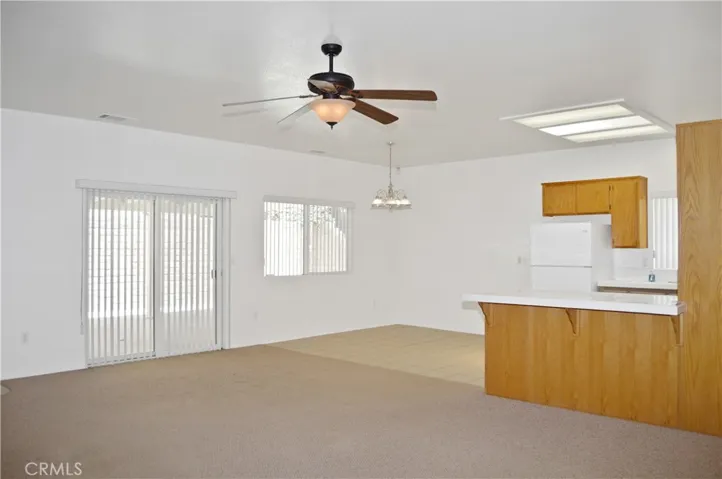 Great Room with Living Area Open to Kitchen and Dining