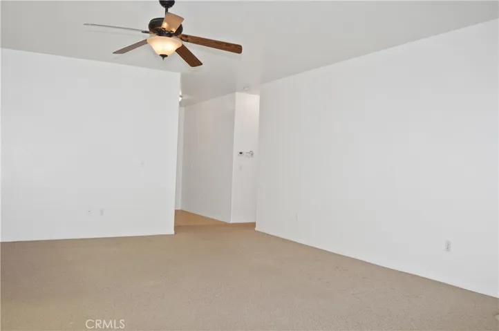 Cozy Fireplace, Ceiling Fan, Sliding Door to Expansive Covered Patio