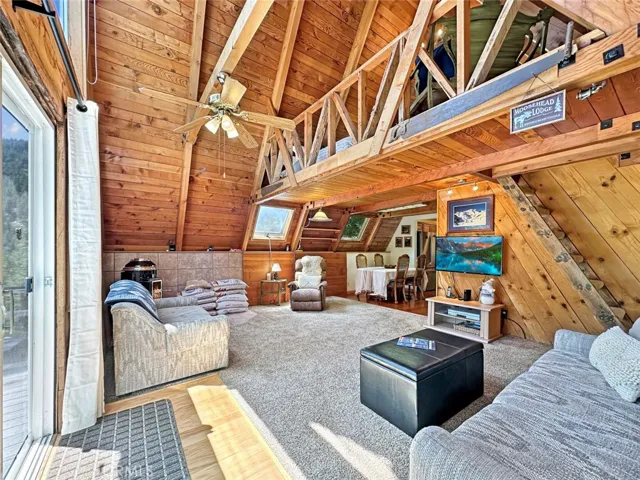 Living Room with Upstairs Loft