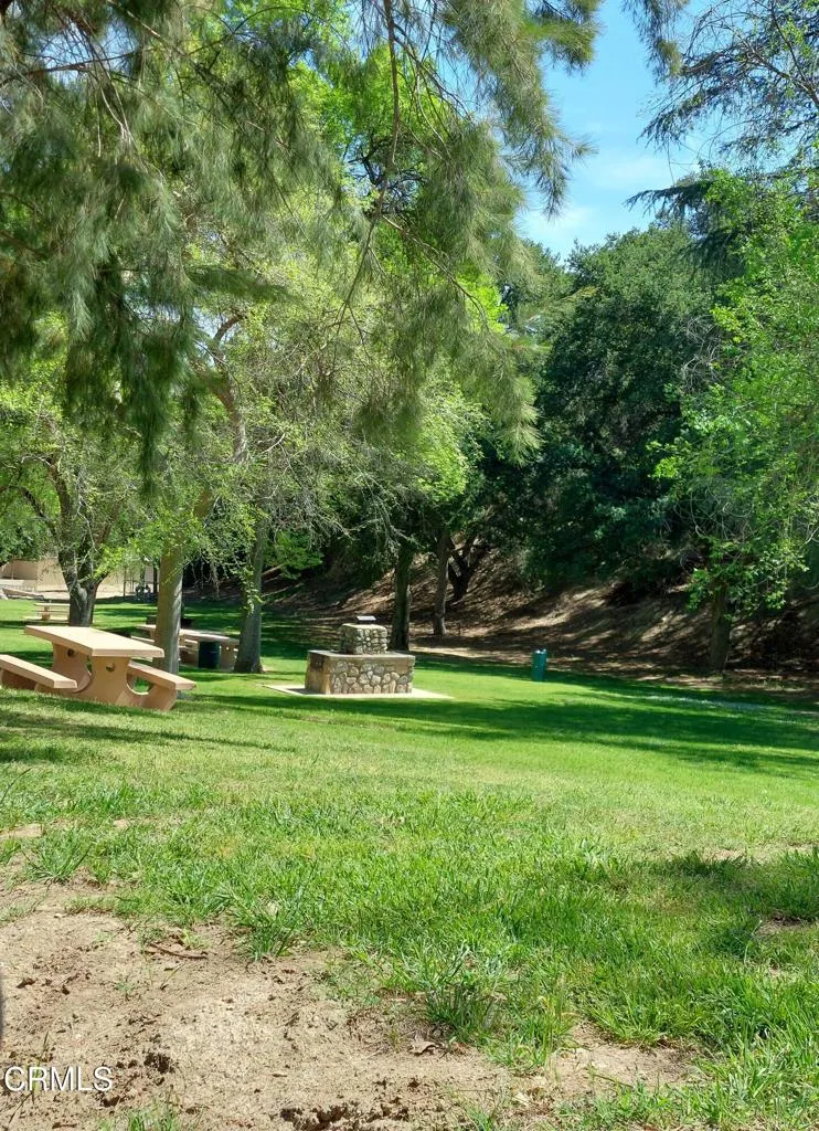 Barbecue & picnic table at park
