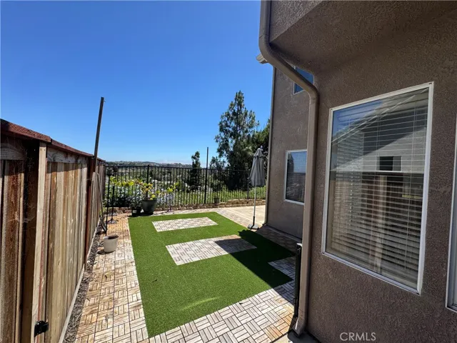 Spacious back yard with view