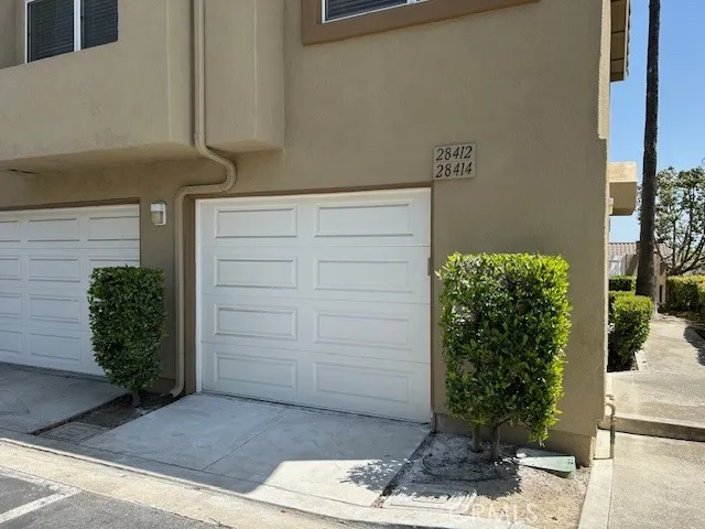 Single car garage attached to condo