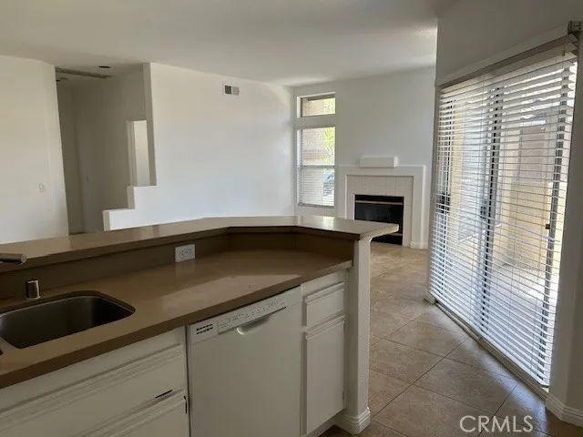 Kitchen looking into living room