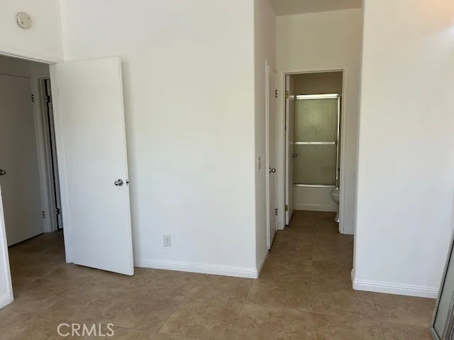 Primary bedroom lookinfg to bathroom
