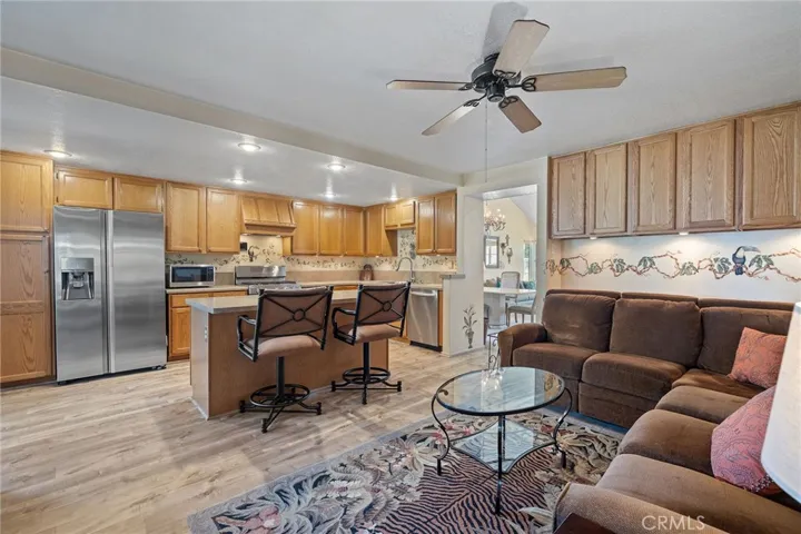 Large open kitchen with lots of cabinets and appliances included.