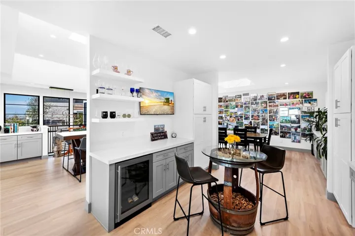 Breakfast nook boasts built-ins and a wine cooler.