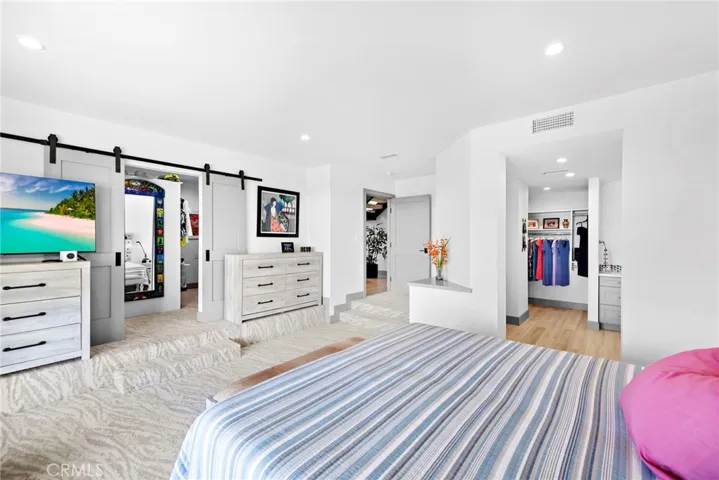 The master suite retreat which was an option with the builder to be the 4th bedroom, is now a walk-in closet with an island.