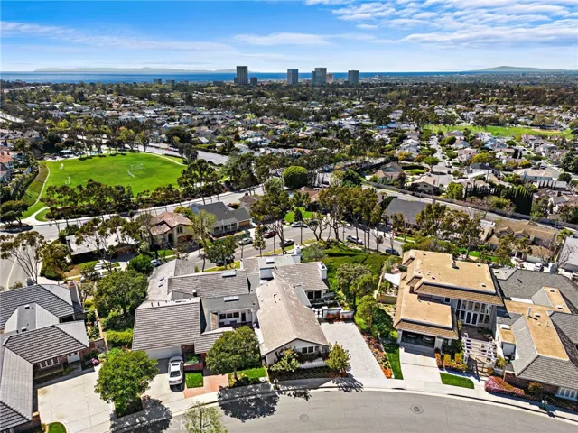 Another aerial photo showing the park down below the property and close proximity to the Fashion Island mall, medical offices and the beach