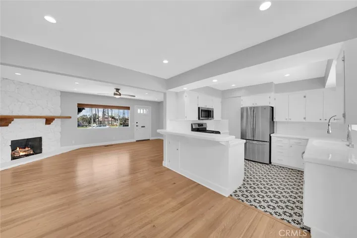 Living Room/Dining Area Facing Kitchen.