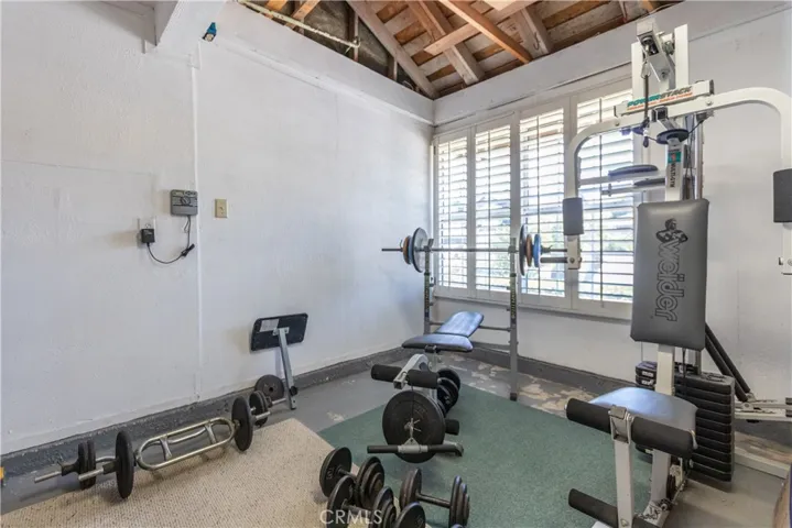 Enclosed gym in the garage.