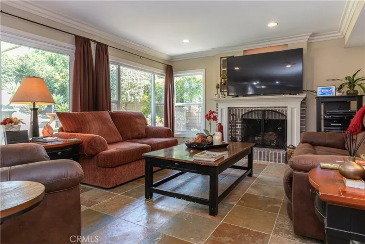 Spacious family room with a fireplace.
