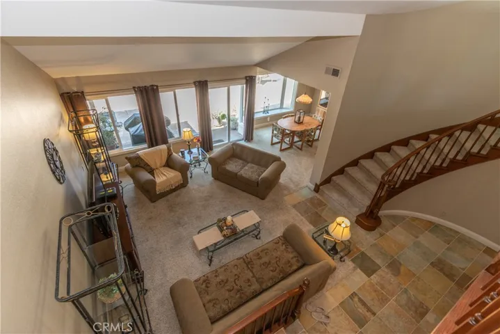 Beautiful interior with soaring ceiling and lovely windows.