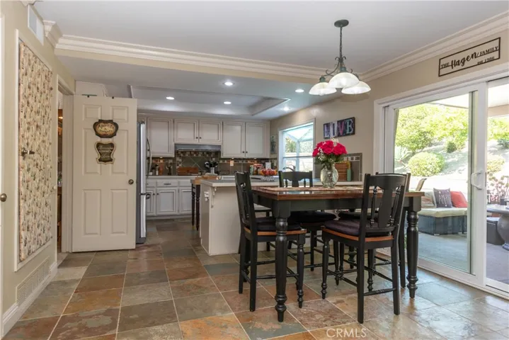 Spacious kitchen and breakfast area with slider to the patio.
