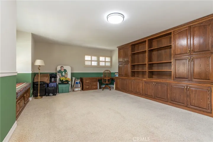 Terrific built-in cabinetry in bonus room.