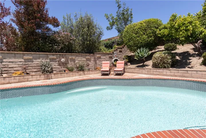 Lovely slope and pool deck.