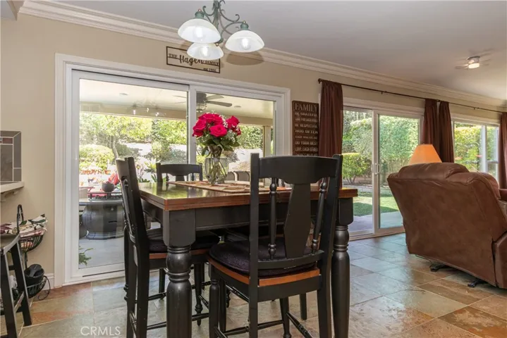 Breakfast area with sliding door to the backyard.