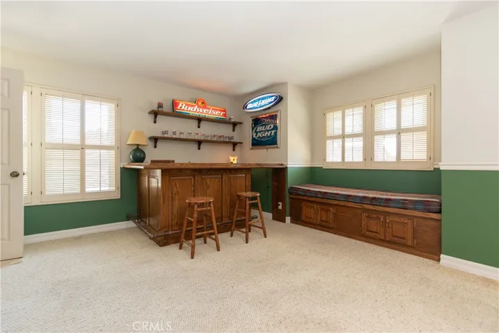 Massive bonus room upstairs with built-in bar.