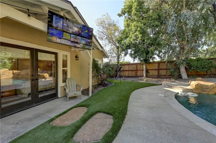 The seller put a TV for easy viewing from the pool!
