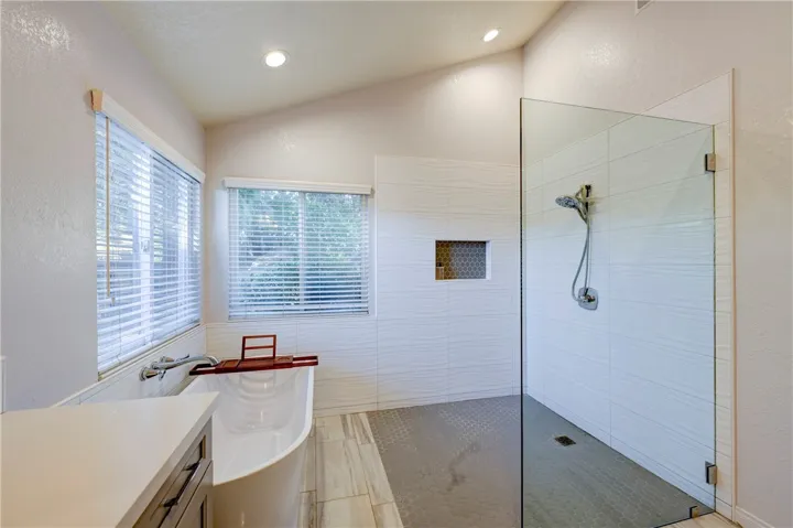 Primary bath with soaking tub and large walk in shower.