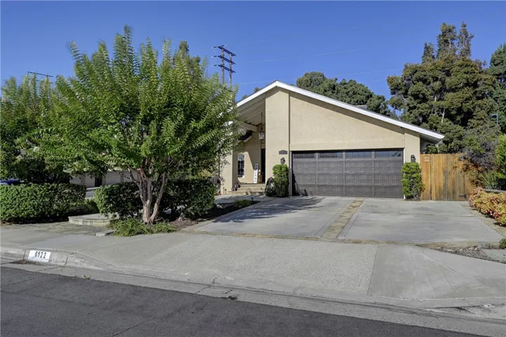 Corner lot with 2 car garage.