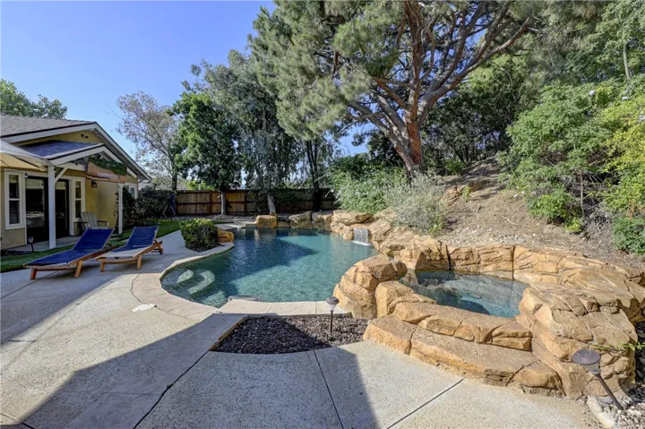 The trees make the backyard feel very private.
