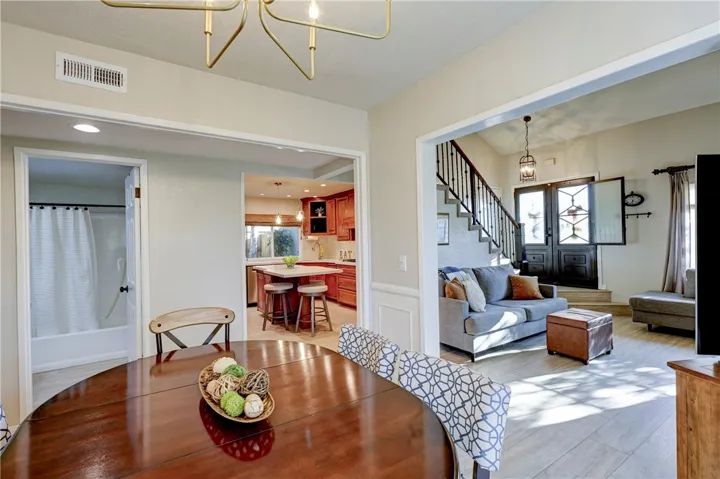 Dining room opens to kitchen and family room, great for entertaining.