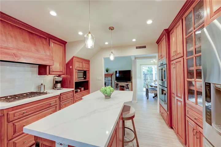 From the living and dining room to the kitchen.