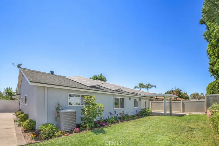 Spacious backyard surrounded by nice vinyl fencing. Solar system to keep utility expenses lower.