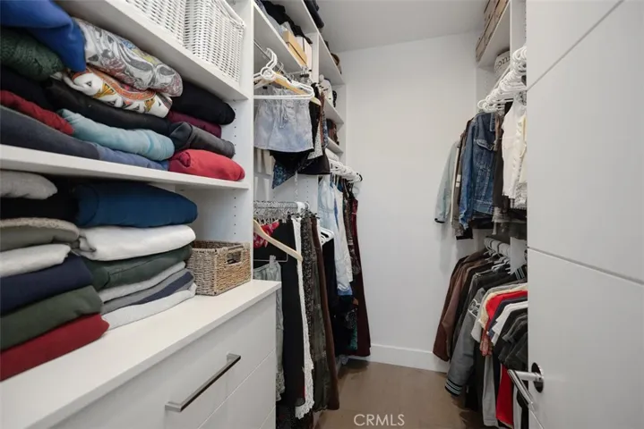 Walk in closet in secondary bedroom suite