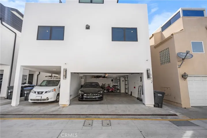 Two Car Garage for Upper Unit, Tandem Carport for Lower Unit