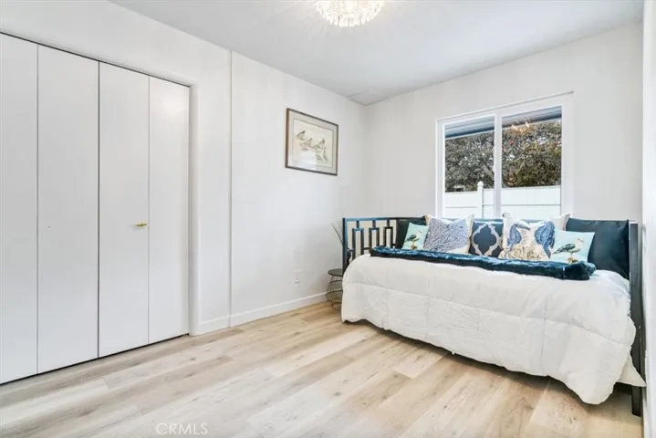 Downstairs bedroom with adjacent bathroom